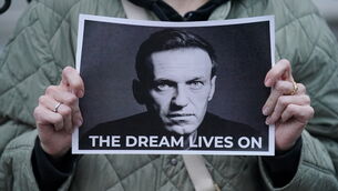 <p>A protester holding a picture of Alexei Navalny at a protest opposite the Russian Embassy in London in 2024. Picture: Jonathan Brady/PA</p> <p>A protester holding a picture of Alexei Navalny at a protest opposite the Russian Embassy in London in 2024. Picture: Jonathan Brady/PA</p>