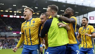 <p>Louis Reed celebrates with teammates. Pic: Richard Sellers/PA</p>