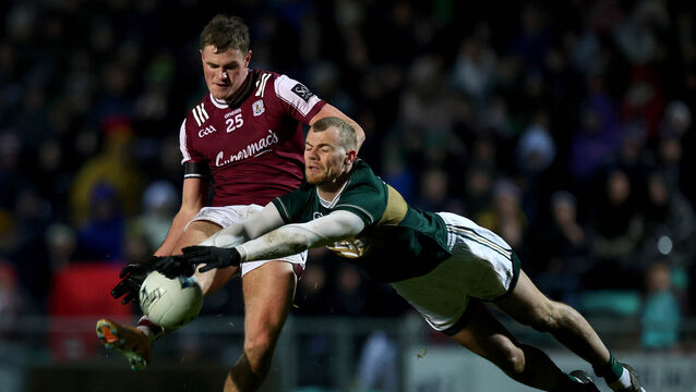 <p>FLAT OUT: Kerry’s Mark O’Shea and Charlie Power of Galway. Pic: INPHO/Ryan Byrne</p>