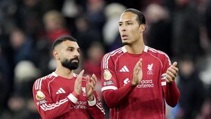<p>Liverpool captain Virgil van Dijk (right) with team-mate Mohamed Salah (Peter Byrne/PA).</p>