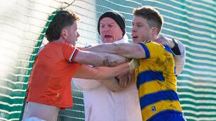 <p>EASY, LADS: Umpire Sylvie Maguire goes above and beyond his normal duties to stop a row between Roscommon's Ronan Daly and Ross McQuillan of Armagh escalating Dr. Hyde Park. Pic: James Lawlor, Inpho</p> <p>EASY, LADS: Umpire Sylvie Maguire goes above and beyond his normal duties to stop a row between Roscommon's Ronan Daly and Ross McQuillan of Armagh escalating Dr. Hyde Park. Pic: James Lawlor, Inpho</p>