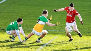 <p>NET GAINS: Cork's Mark Cronin squeezes home the Rebels' third goal in their Division 2 victory over Offaly in Tullamore. Offaly goalkeeper Conor Melia and Rory Egan wonder how.. Pic: Thomas Flinkow/Sportsfile</p>
