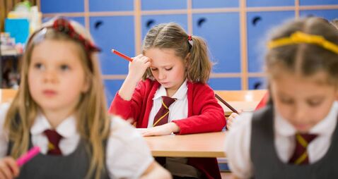 Little Girl Struggling With School Work