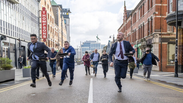 <p>Flipping fun at the Metropole Hotel’s annual pancake race where traders from the VQ area of Cork City gathered to claim the winning title. Azim Ali (left) from The Address and Robert Bejanishvili (right) of The Metropole Hotel were joint winners. Pictures: Brian Lougheed</p>