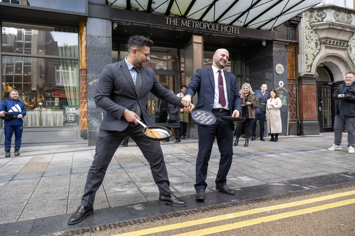 Azim Ali (left) and Robert Bejanishvili (right) having some flipping fun at the Metropole Hotel’s annual pancake race in Cork City. Picture: Brian Lougheed Azim Ali (left) and Robert Bejanishvili (right) having some flipping fun at the Metropole Hotel’s annual pancake race in Cork City. Picture: Brian Lougheed