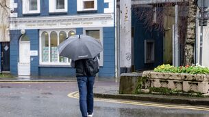 <p> Weather Stand Alone: XX/EE 21/01/26: A pedestrian shelters from the rain under an umbrella in Douglas Street. picture Chani Anderson #rain #flood #weather #umbrella #wet</p>