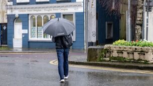 <p> Weather Stand Alone: XX/EE 21/01/26: A pedestrian shelters from the rain under an umbrella in Douglas Street. picture Chani Anderson #rain #flood #weather #umbrella #wet</p>