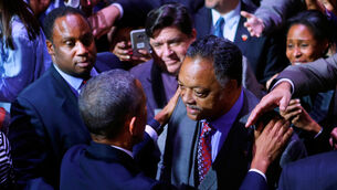 Barack Obama talking to Rev Jesse Jackson (AP)