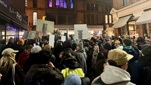 <p>People attend a protest outside the Hoxton Hotel in Dublin, objecting to an injunction the hotel, on Exchequer Street has sought against a late-night venue Yamamori Izakaya on South Great George's Street over noise issues. Picture: Bairbre Holmes/PA Wire</p>