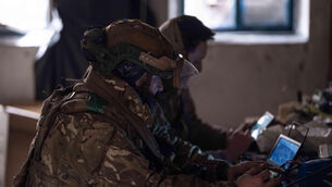 Ukrainian soldiers control a drone to send food to fellow troops on a mission on the front line near Kostyantynivka (Iryna Rybakova/Ukraine’s 93rd Mechanized Brigade via AP)