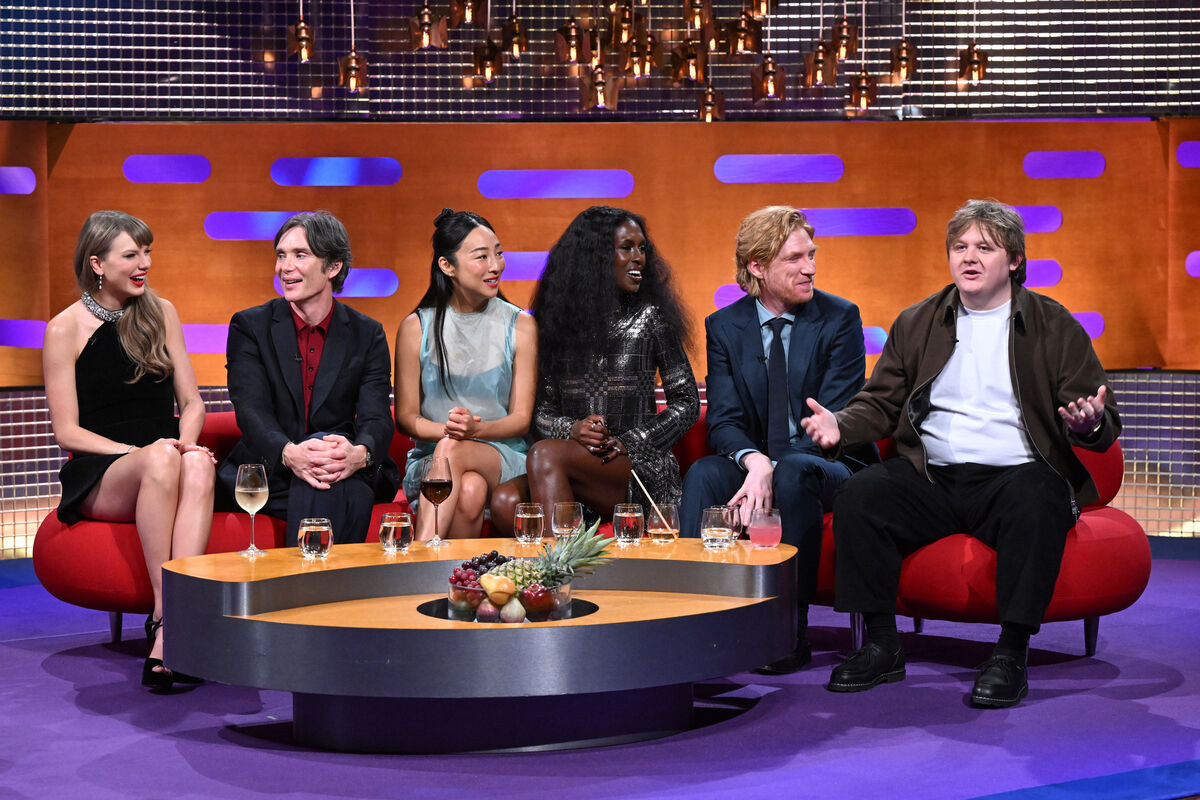 (Left to right) Taylor Swift, Cillian Murphy, Greta Lee, Jodie Turner-Smith, Domhnall Gleeson and Lewis Capaldi on the Graham Norton Show last year where the ‘Opalite’ music video that was apparently conceived on the red couch. File picture: Matt Crossick/PA Media Assignments/PA