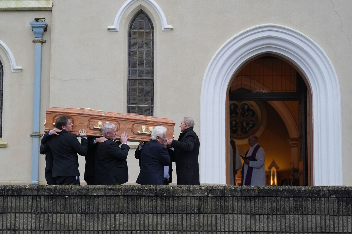 Pall bearers carry the coffin in to the funeral of Aine O'Reilly at St John the Baptist Church in Nicker, Co Limerick. Picture: Niall Carson/PA Wire