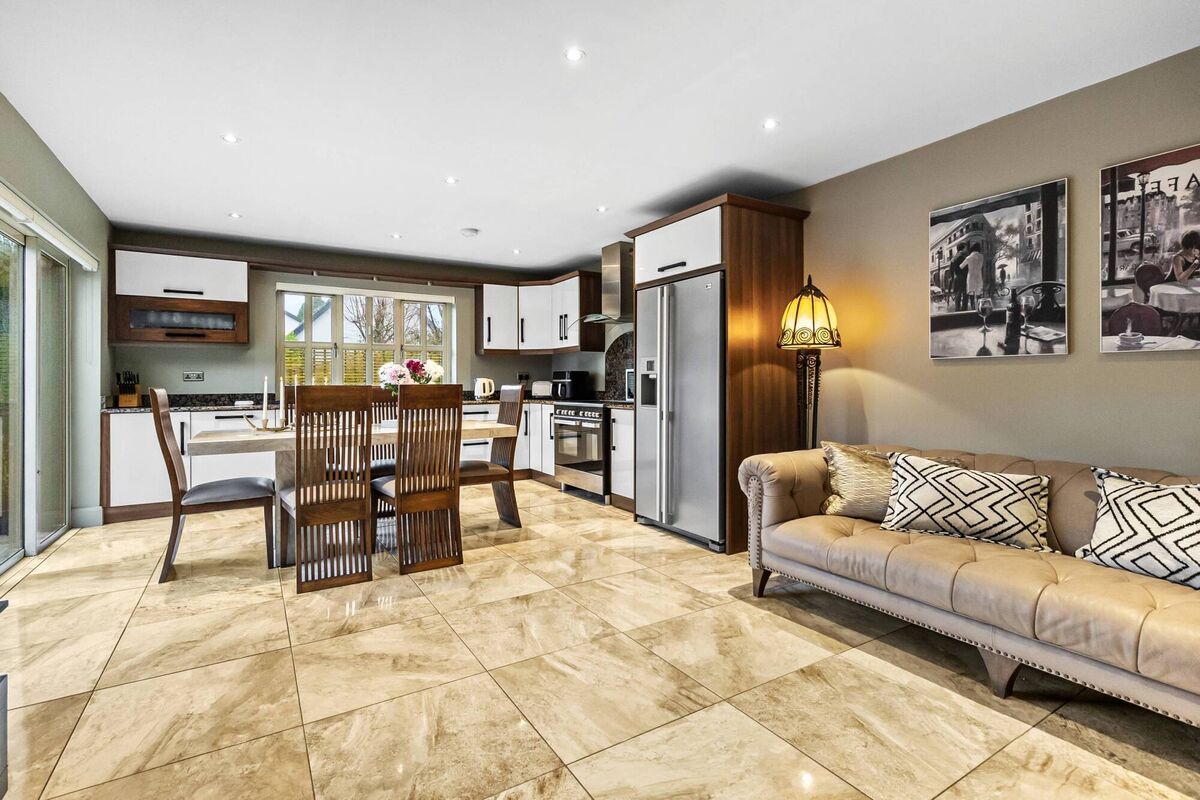 21A Dunlocha Cottages, Blackrock has an open plan kitchen/dining with quality granite-topped white gloss and walnut-trimmed units