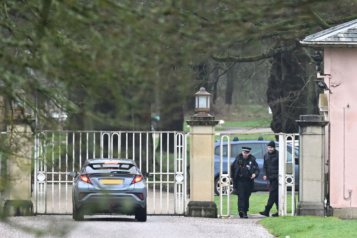 Police officers are stationed outside as pedestrians and vehicles approach the gates of the Royal Lodge, Andrew Mountbatten-Windsor's former residence in Windsor Great Park, February 19, 2026 in Windsor, England. Picture: Leon Neal/Getty Images