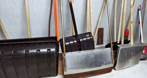Working tools for cleaning snow in a snowfall. Shovels.