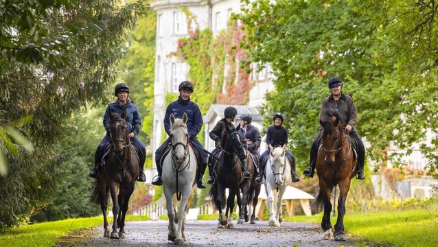 <p>The riding group with MJ Equestrian, cantering around the grounds at Mount Juliet, Kilkenny. Photograph: Patrick Browne</p>
