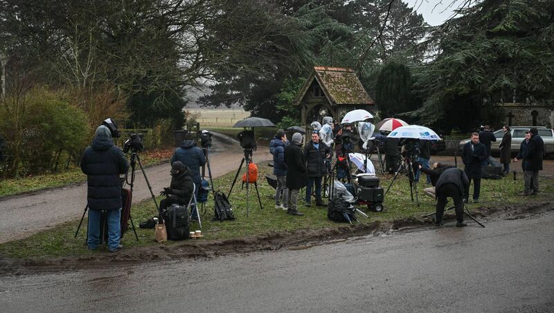 Members of the media are pictured camped out at an entrance to Wood Farm on the royal family's Sandringham Estate in Norfolk, England, on  Thursday where former prince Andrew was arrested earlier in the day. Picture: Justin Tallis / AFP via Getty