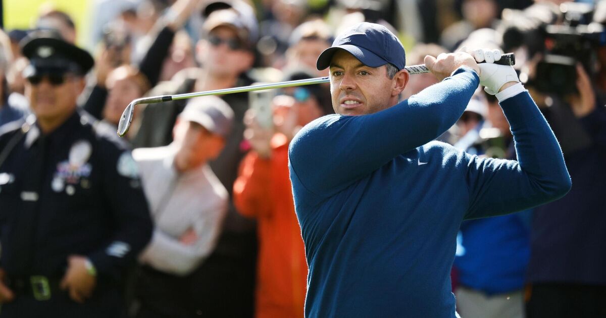 Rory McIlroy battles wild weather to claim share of the lead in Los Angeles