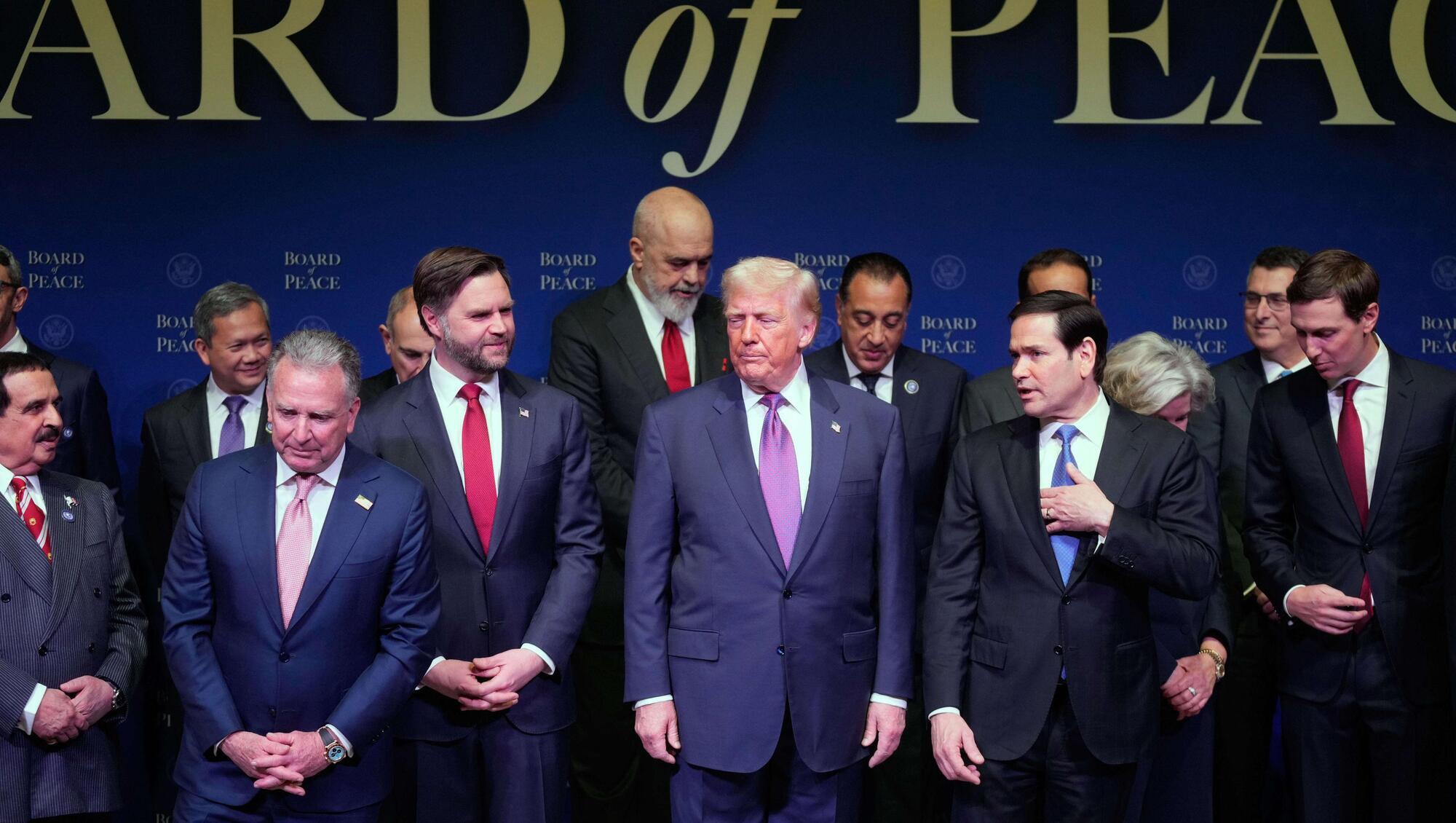 US president Donald Trump, centre, with vice president JD Vance to his left, and secretary of state Marco Rubio to his right, arrives for a Board of Peace meeting at the US Institute of Peace, on Thursday in Washington. Picture: Mark Schiefelbein/ AP