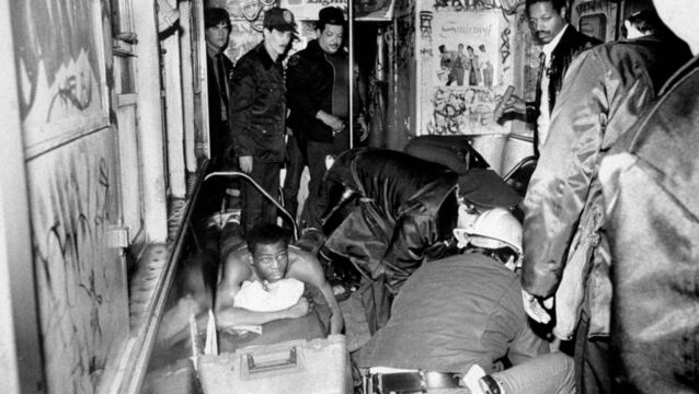 <p>One of the four men wounded by Bernie Goetz is aided on the Seventh Avenue IRT train in New York on december 22, 1984. Picture: Carmine Donofrio/NY Daily News via Getty</p>