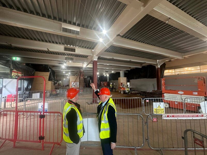 Cork Airport general manager Niall MacCarthy (right) shows Irish Examiner deputy business editor Martin Claffey the vast steel skeleton structure in the construction area below the new mezzanine at Cork Airport.