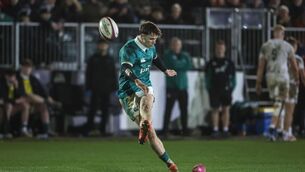 <p>Ireland's Tom Wood kicks a conversion. Pic:  ©INPHO/Dan Sheridan</p>
