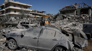A building was destroyed by an Israeli strike in the village of Bednayel in eastern Lebanon (AP)