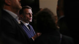 Emmanuel Macron appealed for calm (Pool via AP)