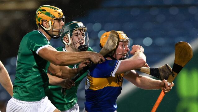 <p>NO ESCAPE: Seán Kenneally of Tipperary is tackled by Matthew Fitzgerald and Dan Morrissey of Limerick and wins a penalty during the Allianz Hurling League Division 1A match between Tipperary and Limerick at FBD Semple Stadium in Thurles, Tipperary. Photo by Paul Phelan/Sportsfile</p>