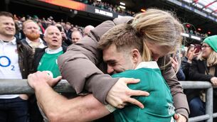 <p>Ireland's Jack Crowley celebrates with family after the match. Pic: ©INPHO.</p>