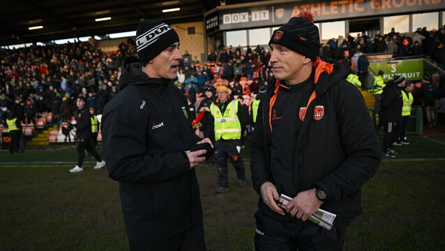 <p>Donegal manager Jim McGuinness, left, and Armagh manager Kieran McGeeney after Division 1 game at the Athletic Grounds. Pic: Ramsey Cardy/Sportsfile</p>