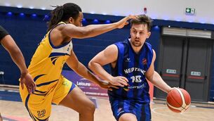 <p> Neptune's Roy Downey is challenged by St Vincent's Denzel Ebose during their Men's Super League clash at the Neptune Stadium. Pic: David Keane.</p>