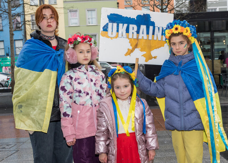 Valeriia Deikun, Kate Melmik, Lada Samusenka and Sasha Tsipan at a commemorative rally on the fourth anniversary of the Russian invasion of Ukraine on Grand Parade, Cork.  Picture: David Creedon