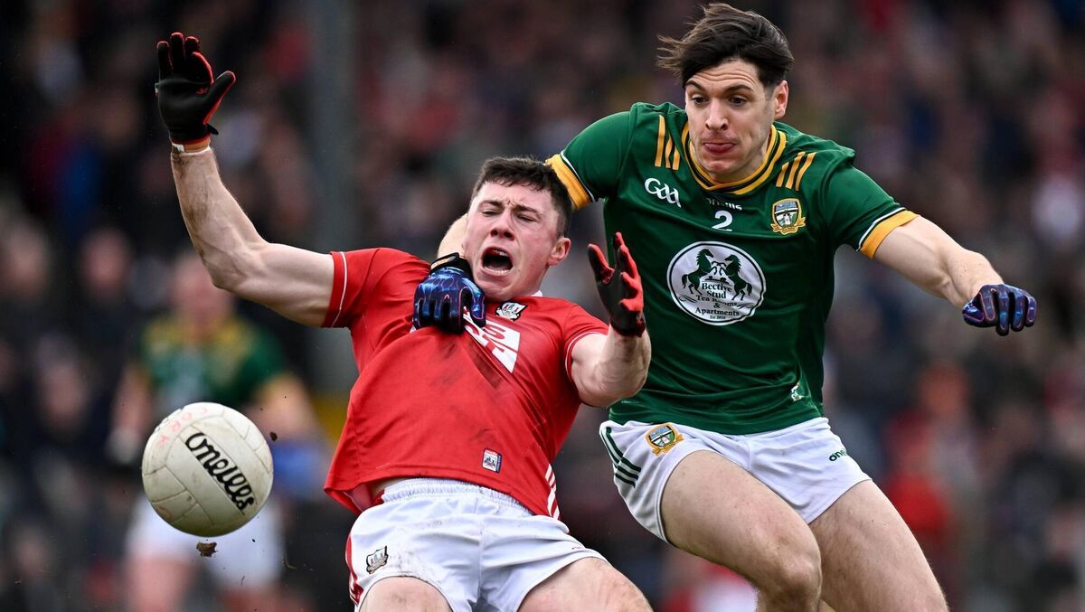 HOLD ME BACK: Cork's Mark Cronin is hauled back by Meath's Seamus Lavin at a packed Páirc Ui Rinn. Pic: Seb Daly/Sportsfile HOLD ME BACK: Cork's Mark Cronin is hauled back by Meath's Seamus Lavin at a packed Páirc Ui Rinn. Pic: Seb Daly/Sportsfile