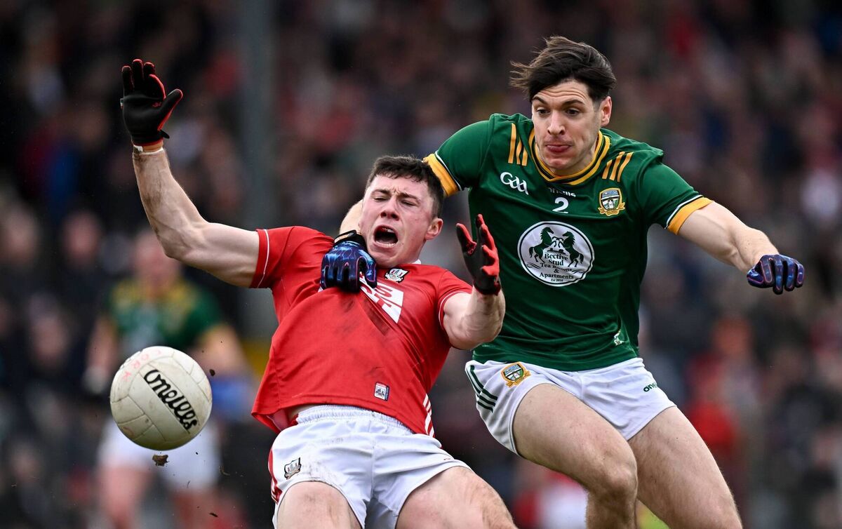 Mark Cronin of Cork is fouled by Seamus Lavin on Sunday. Pic: Seb Daly/Sportsfile