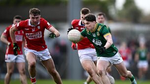 <p>THE CHASE: James Conlon of Meath in action against Cork players Seán Meehan, left, and Ian Maguire. Pic: Seb Daly/Sportsfile</p>