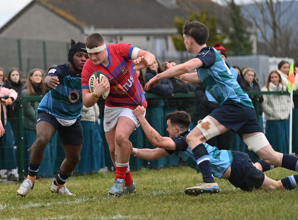  Kalum Kirwan, St Munchin's looking to break past Rowan Brady, Castletroy College during the 2025 Pinergy Schools U19 Munster Senior Cup match at Liam Fitzgerald Park, Limerick. Picture: Dan Linehan