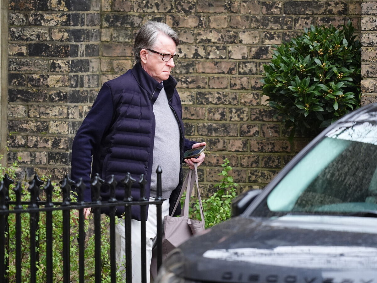 Peter Mandelson outside his home in north west London.