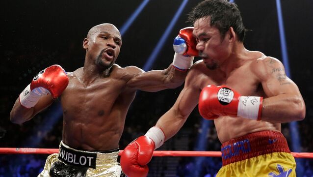 <p>Floyd Mayweather will face Manny Pacquiao in a rematch in September. Pic: Isaac Brekken/PA</p>