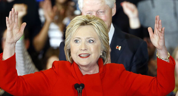 Hillary Clinton secures narrow win in Iowa