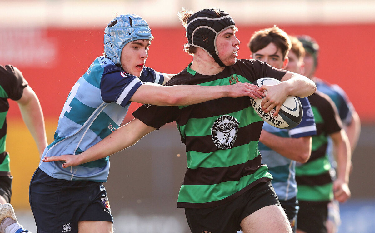 Bandon’s Adam Barry with Robert Sheehan of Castletroy. Pic: ©INPHO/Tom O’Hanlon