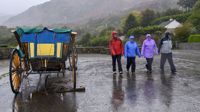<p> Tourists from Colorado, USA, brave the Irish weather at the Gap of Dunloe, Co Kerry. Picture: Dan Linehan</p>