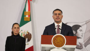 <p>Mexican Security and Citizen Protection Minister Omar Garcia Harfuch speaks as President Claudia Sheinbaum looks on during her daily, morning news conference at the National Palace in Mexico City, Monday, Feb. 23, 2026, the day after the Mexican army killed Jalisco New Generation Cartel leader Nemesio Oseguera, known as "El Mencho". Pic: AP Photo/Ginnette Riquelme.</p>
