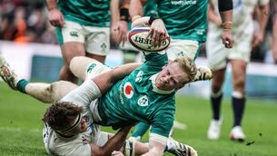 <p>Jamie Osborne scores a try as Ireland hammered England at Twickenham in the Six Nations. Pic: Inpho</p>