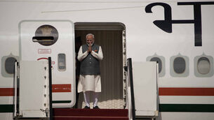Narendra Modi arrives to meet with Israeli PM Benjamin Netanyahu 9Leo Correa/AP)