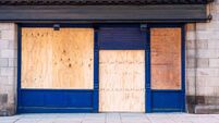 Boarded up shop