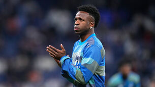 <p>Real Madrid’s Vinicius Junior applauds to supporters during the warm up before the second leg of the Champions League play-off game against Benfica. Pic: Manu Fernandez/AP</p> <p>Real Madrid’s Vinicius Junior applauds to supporters during the warm up before the second leg of the Champions League play-off game against Benfica. Pic: Manu Fernandez/AP</p>