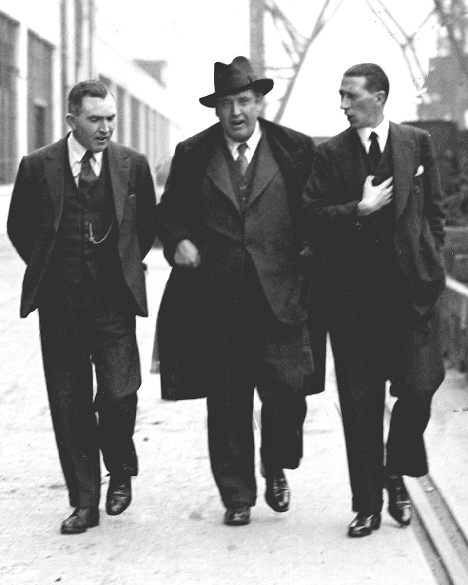 John McCormack, centre, at the Ford motor factory on one of his visits to Cork. He's pictured with American pianist Edwin Schneider, and works manager EL Clarke. Picture: Irish Examiner Archive 