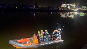 <p>Crosshaven Coast Guard at the scene in Cork city tonight</p>