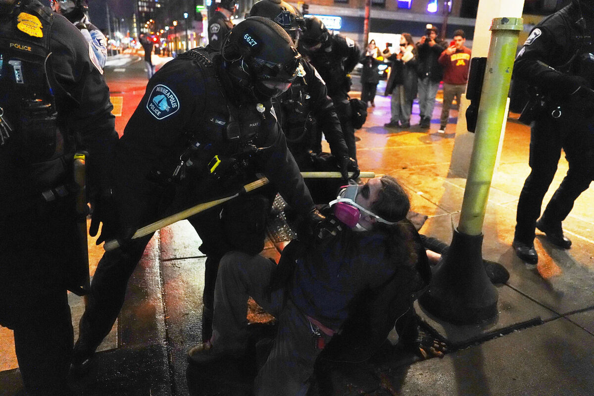 Minneapolis police detain a demonstrator during a protest in Minneapolis last month. Picture: AP /Ryan Murphy